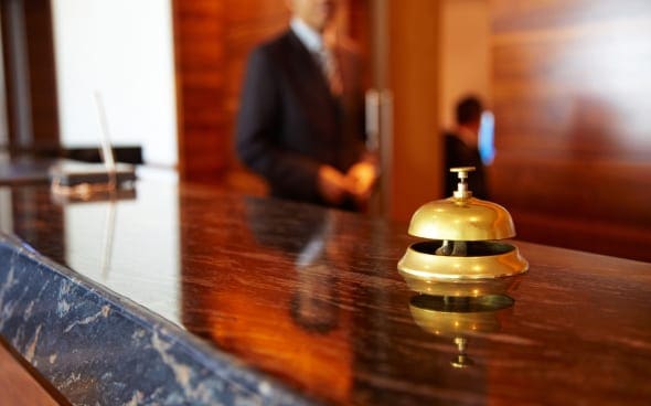 concierge desk with gold bell