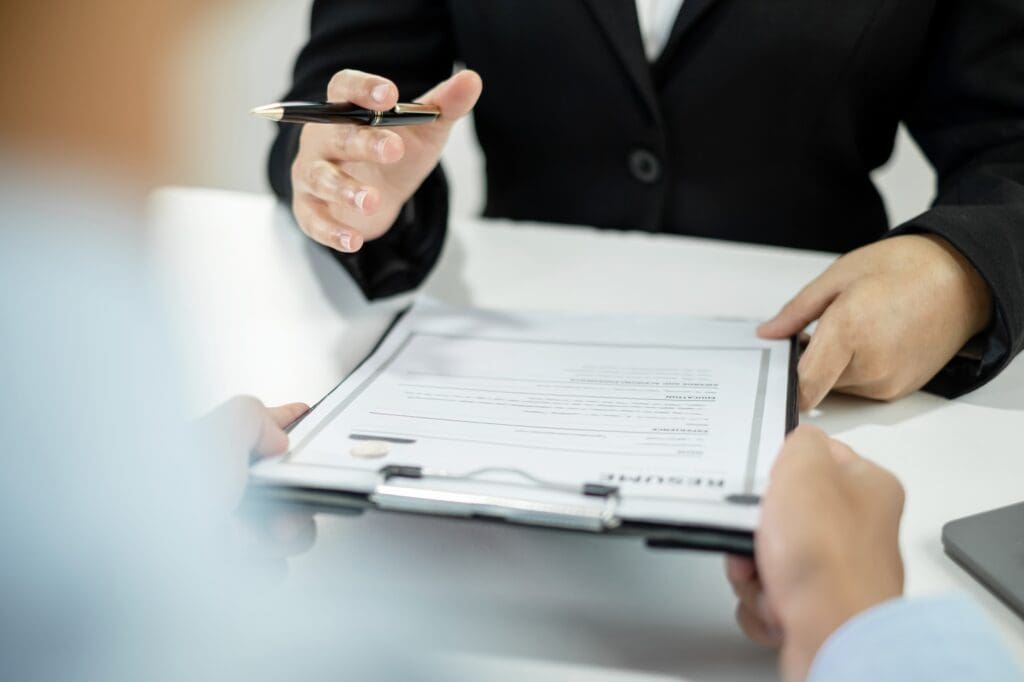 HR Manager talks to job applicants for job interviews about careers and Her personal history